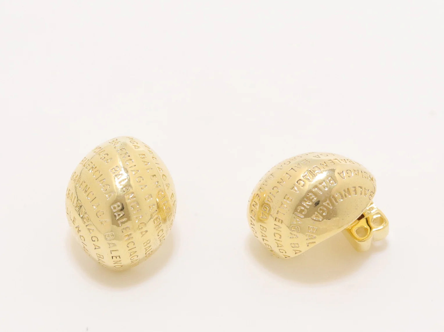 Gold alphabet embossed studs