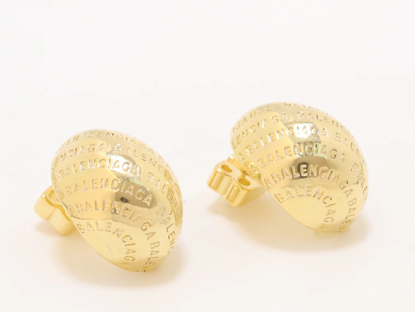 Gold alphabet embossed studs
