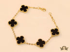 Gold plated chain bracelet with black clover