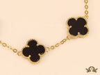 Gold plated chain bracelet with black clover