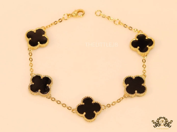 Gold plated chain bracelet with black clover