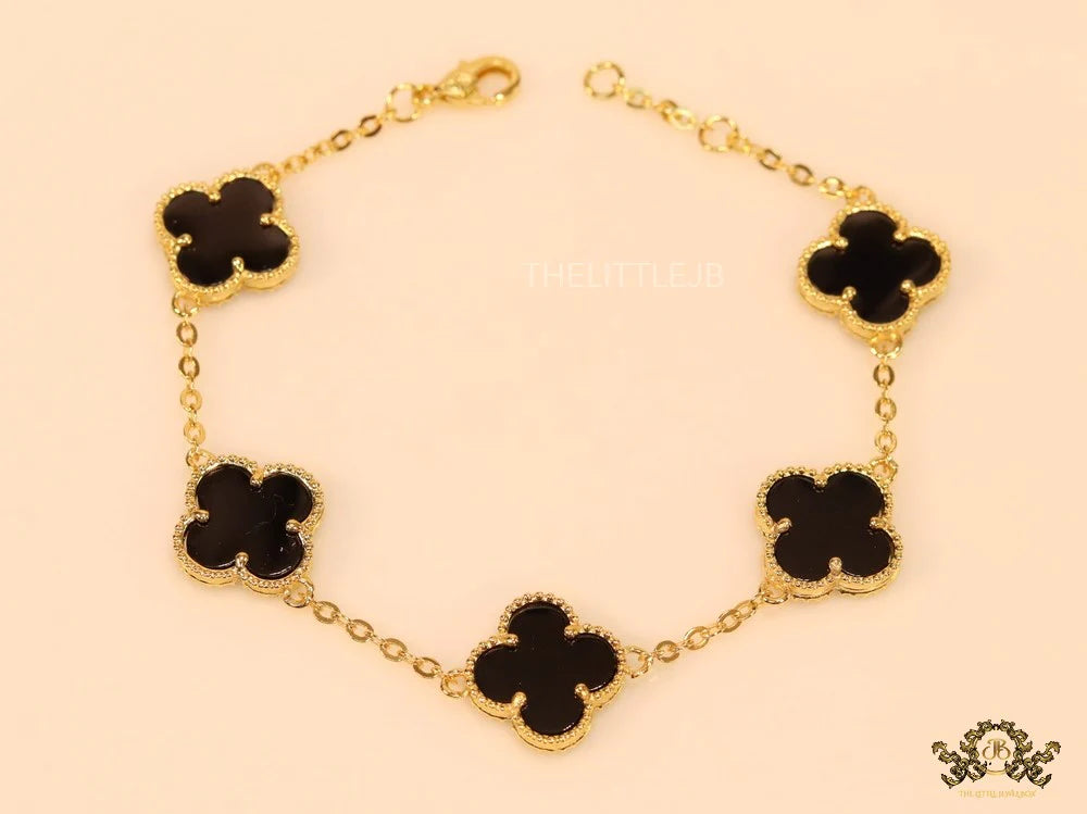 Gold plated chain bracelet with black clover