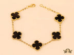 Gold plated chain bracelet with black clover
