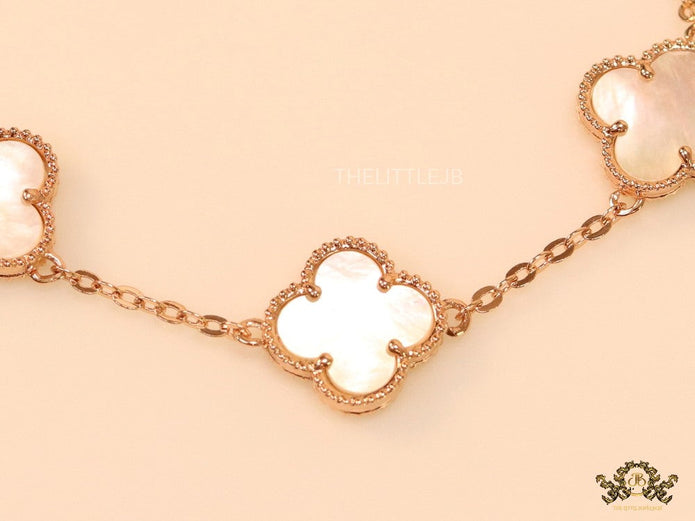Rose gold plated chain bracelet with mother of pearl clover