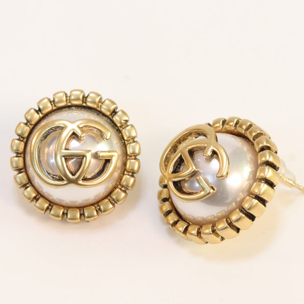Double G rustic pearl studs