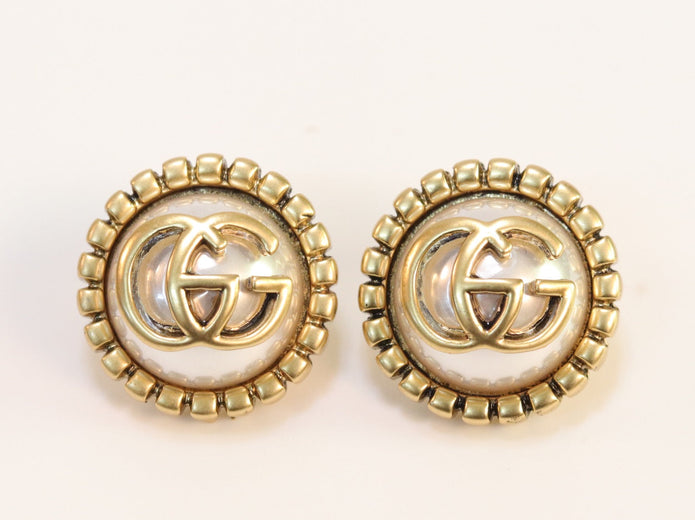 Double G rustic pearl studs