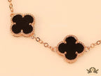 Rose gold plated chain bracelet with black clover