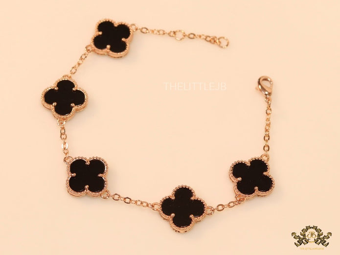 Rose gold plated chain bracelet with black clover