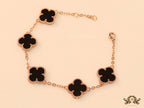 Rose gold plated chain bracelet with black clover
