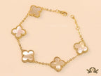 Gold plated chain bracelet with mother of pearl clover