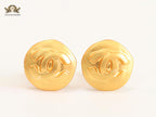 Double C gold clip on studs- big