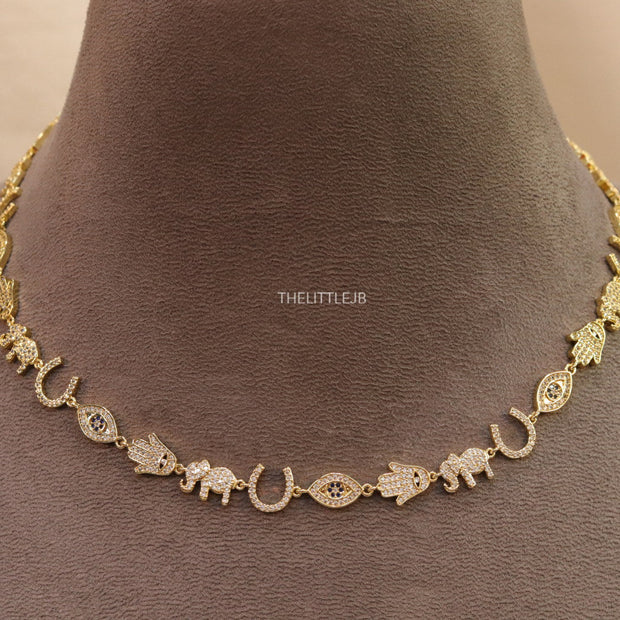 Choker style necklace with charms in gold finish