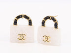 Black and white Double C purse earrings in gold