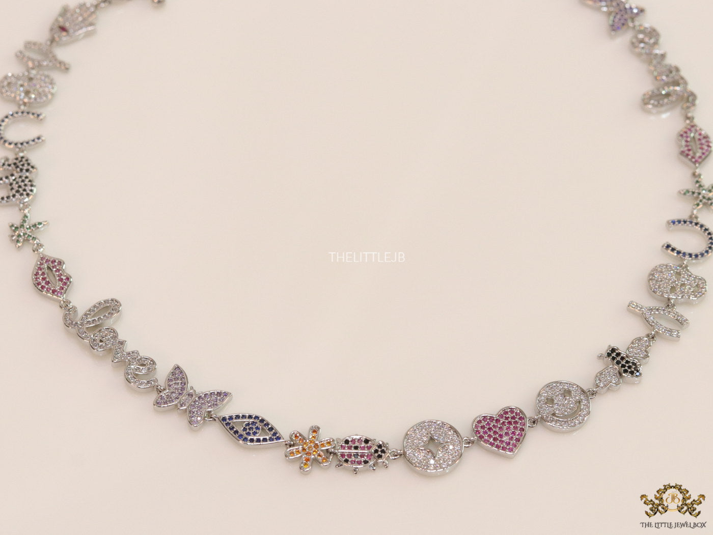 Platinum plated choker style cz lucky charm necklace