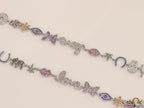 Platinum plated choker style cz lucky charm necklace