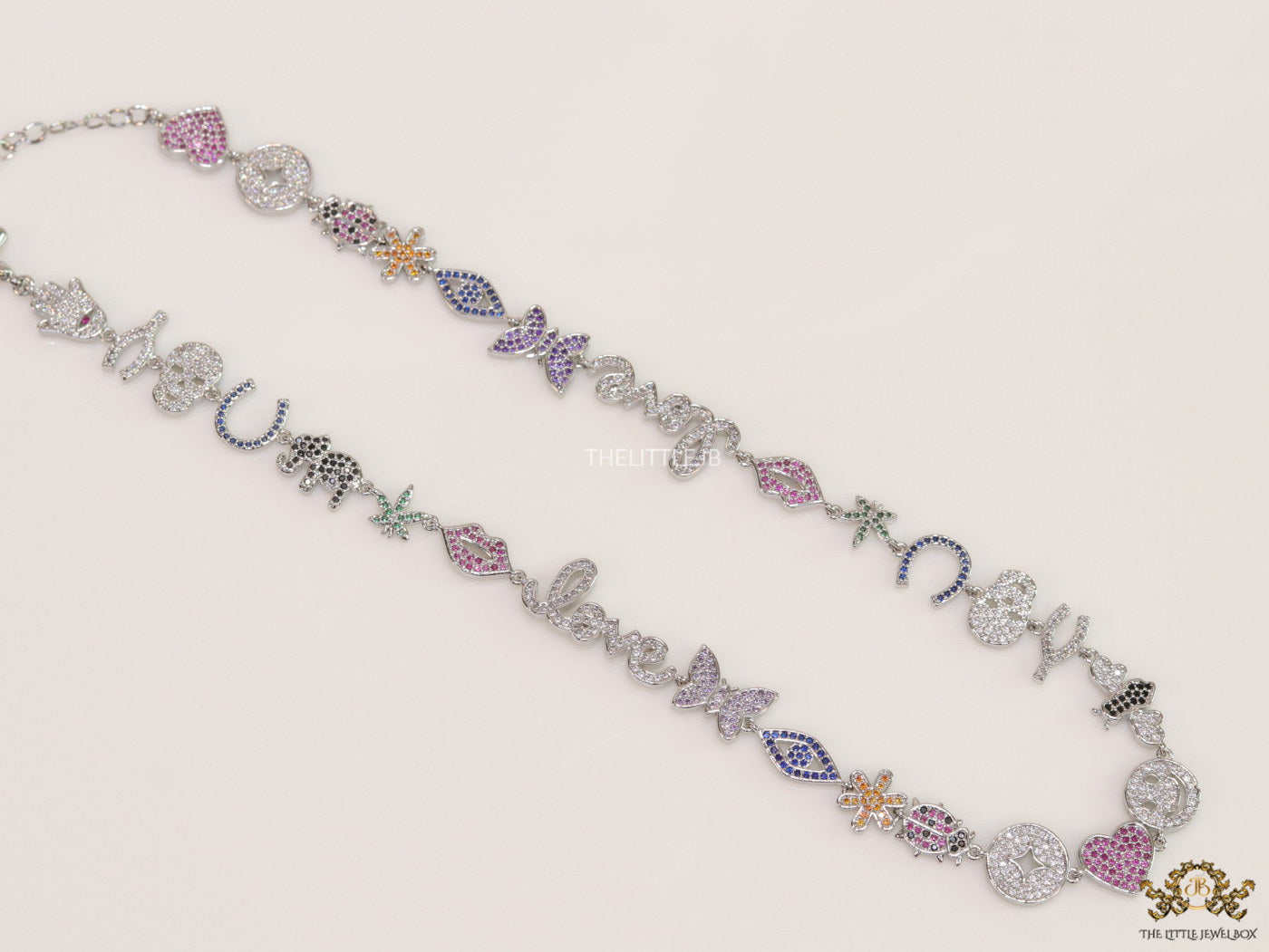 Platinum plated choker style cz lucky charm necklace