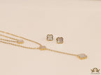 Dual chain necklace with white MOP clover in gold finish