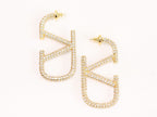 Open golden alphabet V earrings with cz 62 mm