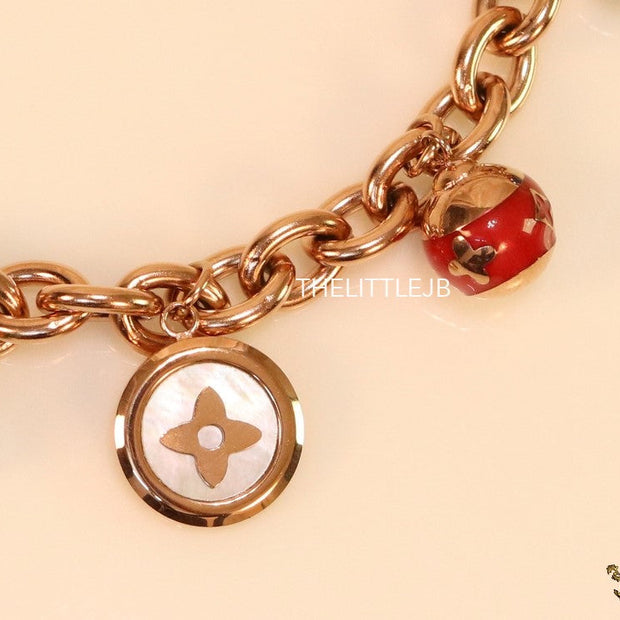 Rose gold plated link chain bracelet with multi enamel and MOP charms