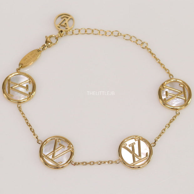 Gold plated sleek chain bracelet with MOP discs