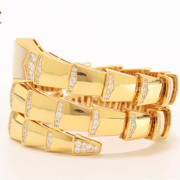 Bold gold and cz serpenti bracelet with mop head