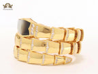 Bold gold and cz serpenti bracelet with black mop head