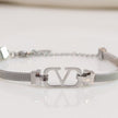 Platinum plated watch strap bracelet with V motif