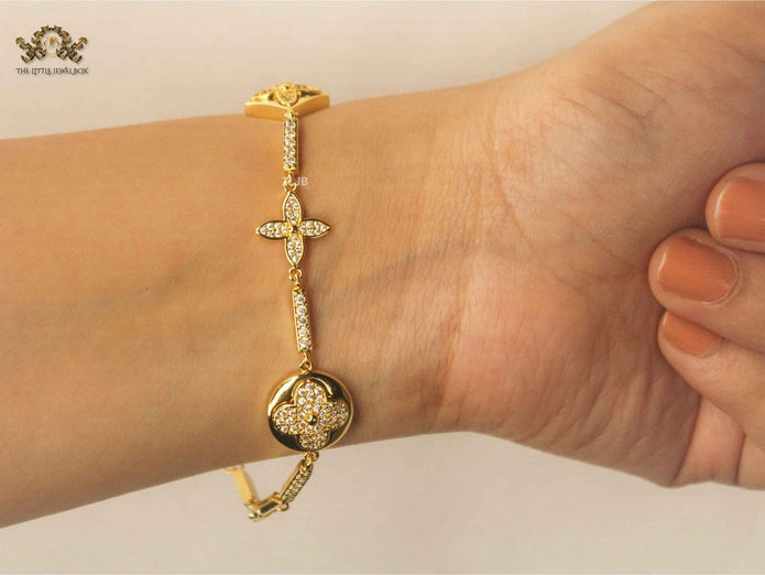 Alphabet L & V gold dazzle bracelet