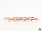 Gold plated layered alphabet ring with tiny embedded cz stones
