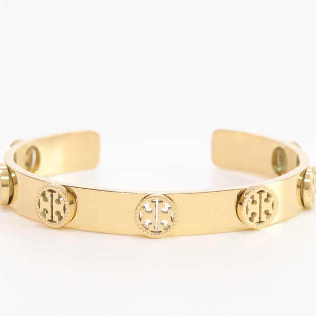 Gold plated open band bracelet with twin T motifs