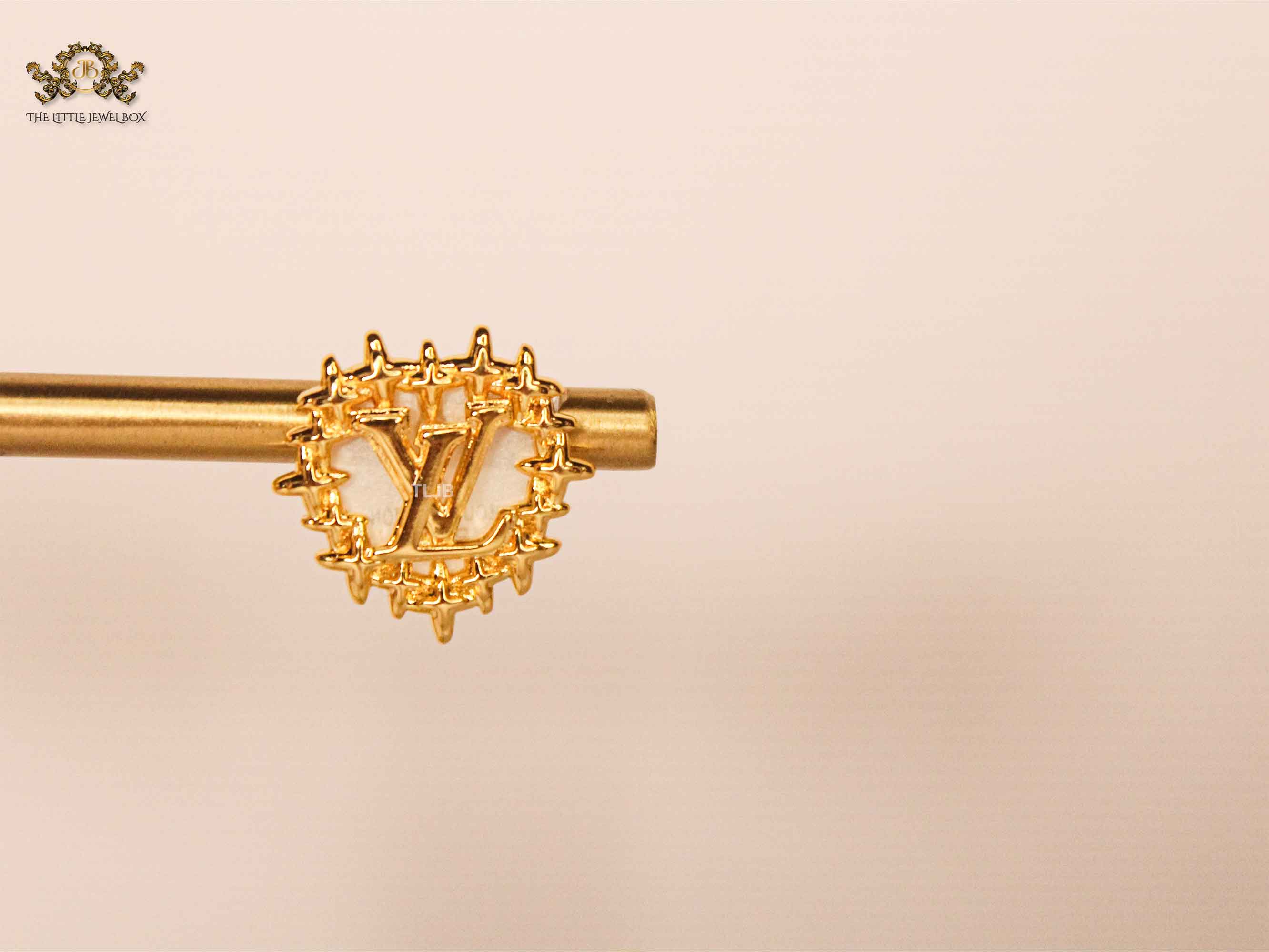 Heart shaped L&V Stud in White MOP & Gold