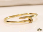 Gold plated nail bracelet with cz