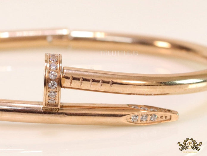 Rose gold plated nail bracelet with cz