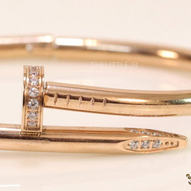 Rose gold plated nail bracelet with cz