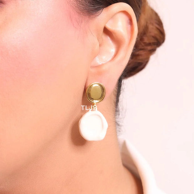 White enamel and gold earrings