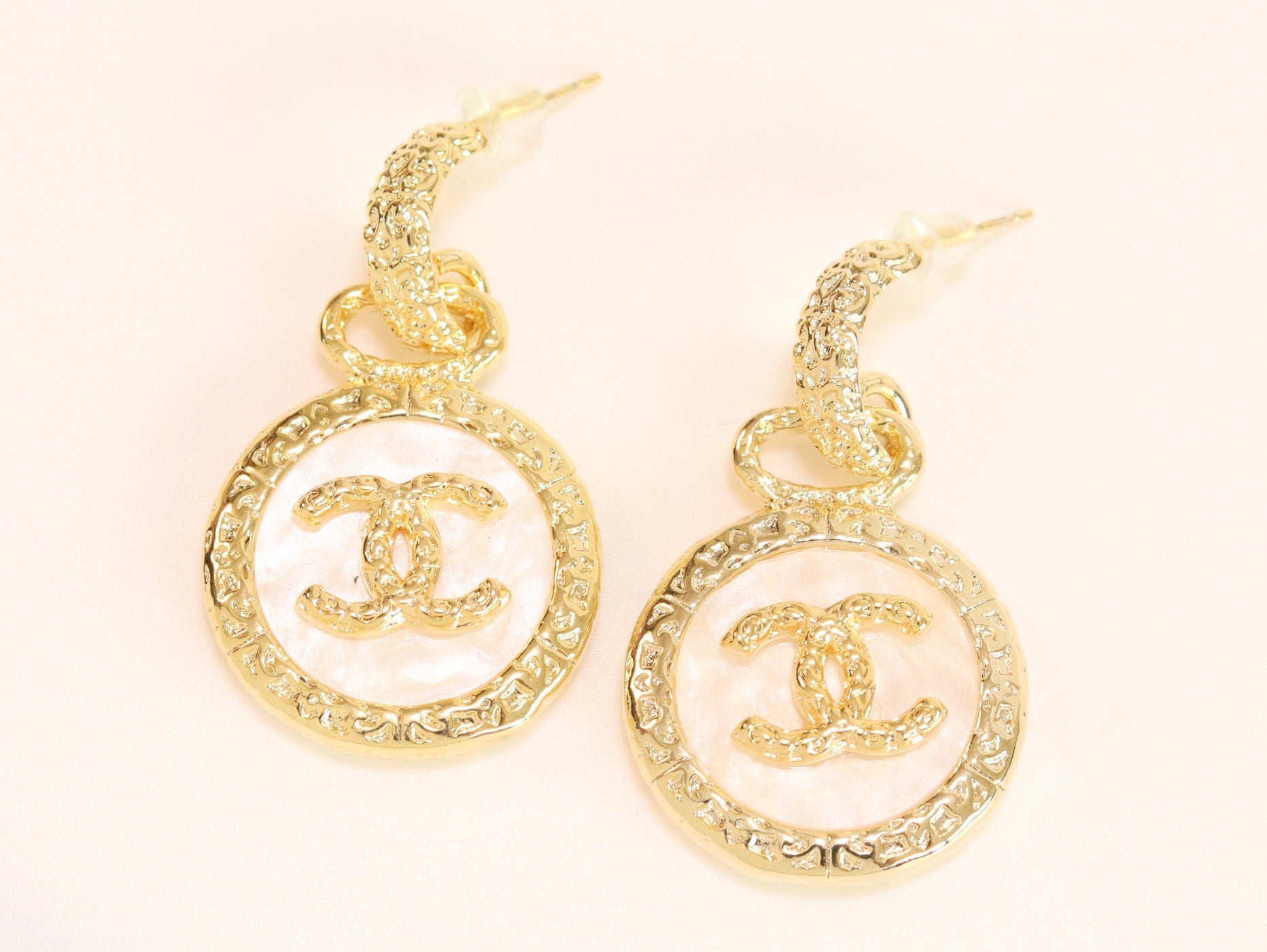 Double C on white enamel hanging gold earrings with CZ