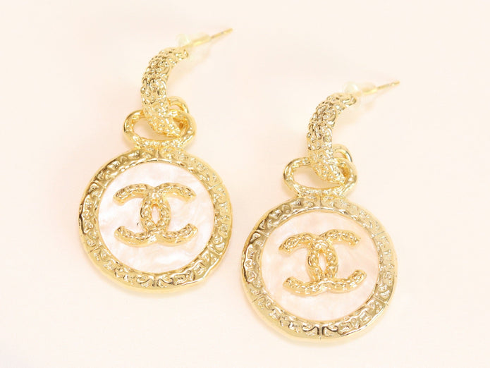Double C on white enamel hanging gold earrings with CZ