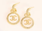 Double C on white enamel hanging gold earrings with CZ