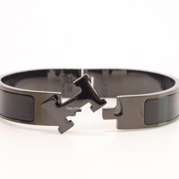Broad black bracelet with H alphabet in centre