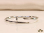 Platinum plated nail bracelet