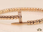 Rose gold plated cz and metallic bead nail bracelet-openable