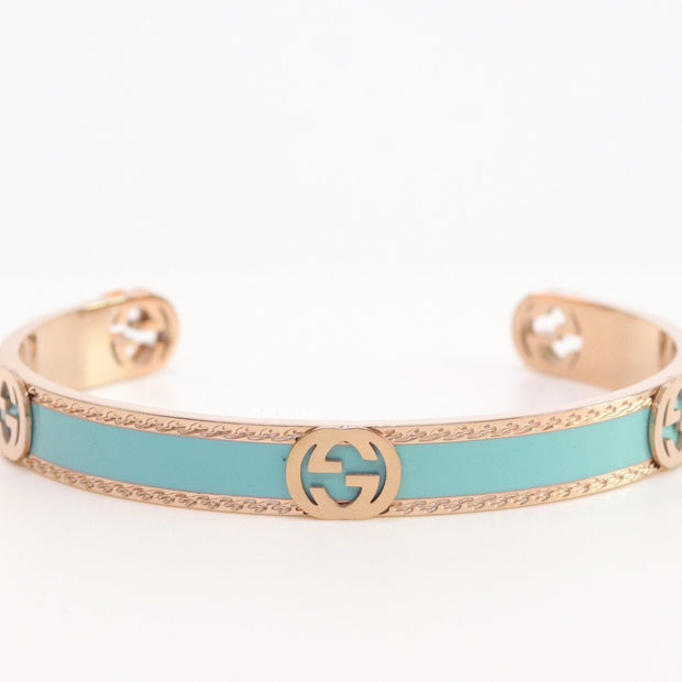 Blue and Rose gold open band bracelet with twin G alphabet motifs