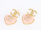 Double C on dangling pink heart gold earrings with CZ