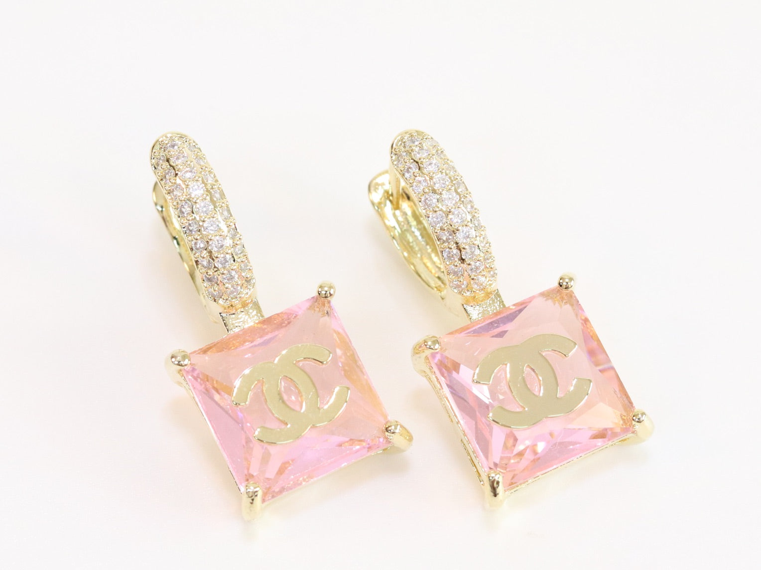 Double C on dangling pink square gold earrings with CZ
