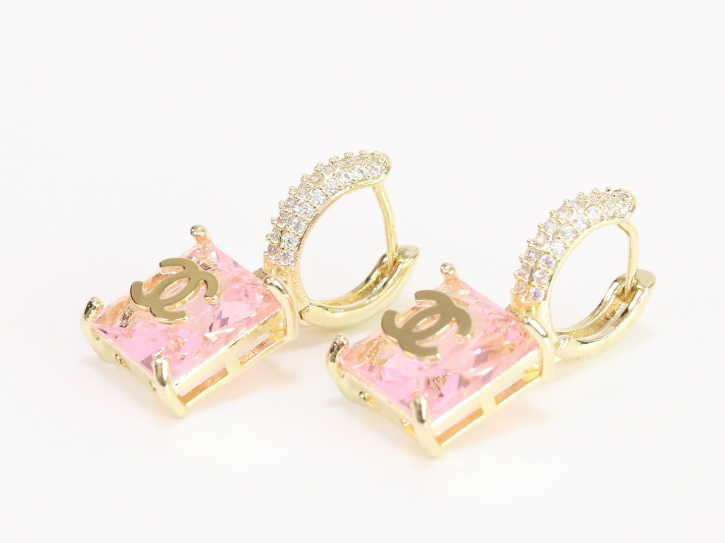 Double C on dangling pink square gold earrings with CZ