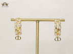 Alphabet CD pearl round earrings