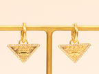 Gold Dangling Triangle earrings on small hoops with CZ