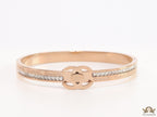 Rose gold plated bracelet with cz, inscribed alphabets and twin disc motif
