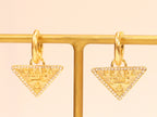Gold Dangling Triangle earrings on small hoops with CZ