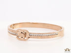 Rose gold plated bracelet with cz, inscribed alphabets and twin disc motif